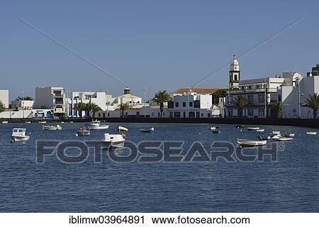 "Redesigned harbour of El Charco de San Gines with the church Iglesia de San Gines, Arrecife, Lanzarote, Canary Islands, Spain, Europe" View Large Photo Image Stock Image - "Redesigned harbour of El Charco de San Gines with the church Iglesia de San Gines, Arrecife, Lanzarote, Canary Islands, Spain, Europe". Fotosearch