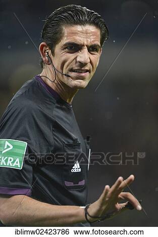 Referee Deniz Aytekin, making a gesture to calm down, Wirsol Rhein-Neckar-Arena, Sinsheim-Hoffenheim, Baden-Wuerttemberg, Germany, Europe View Large Photo Image Stock Photograph - Referee Deniz Aytekin, making a gesture to calm down, Wirsol Rhein-Neckar-Arena, Sinsheim-Hoffenheim, Baden-Wuerttemberg, Germany, Europe. Fotosearch