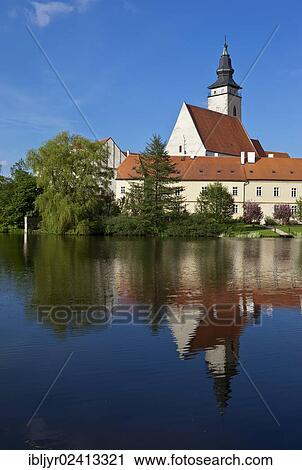 Stock Image - Reflected church, Tel??????? Ñ??? æ??? º????????????????º??ú??????í????????? Ñ??????????? í??????? º??ú???????, Moravia, Czech Republic, Europe. Fotosearch