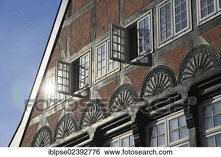 "Reflected sunlight on the window of a half-timbered house, Ploen, Holstein Switzerland, Schleswig-Holstein, Germany, Europe" View Large Photo Image Stock Photograph - "Reflected sunlight on the window of a half-timbered house, Ploen, Holstein Switzerland, Schleswig-Holstein, Germany, Europe". Fotosearch