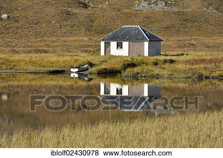 "Reflection of a boat house in the lake in front of Mt Liathach, Glen Torridon, Beinn Eighe National Nature Reserve, SNH, Kinlochewe, Scottish Highlands, Wester Ross, Scotland, United Kingdom, Europe" View Large Photo Image Stock Photo - "Reflection of a boat house in the lake in front of Mt Liathach, Glen Torridon, Beinn Eighe National Nature Reserve, SNH, Kinlochewe, Scottish Highlands, Wester Ross, Scotland, United Kingdom, Europe". Fotosearch
