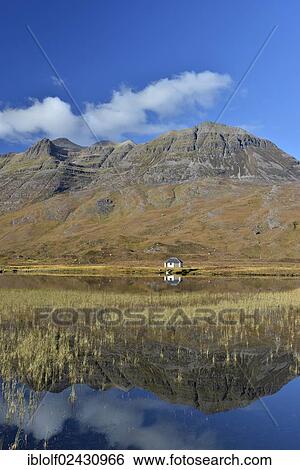 "Reflection of a boat house in the lake in front of Mt Liathach, Glen Torridon, Beinn Eighe National Nature Reserve, SNH, Kinlochewe, Scottish Highlands, Wester Ross, Scotland, United Kingdom, Europe" View Large Photo Image Stock Photograph - "Reflection of a boat house in the lake in front of Mt Liathach, Glen Torridon, Beinn Eighe National Nature Reserve, SNH, Kinlochewe, Scottish Highlands, Wester Ross, Scotland, United Kingdom, Europe". Fotosearch
