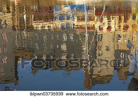 "Reflection of harbour buildings in the water, Honfleur, Normandy, France, Europe" View Large Photo Image Stock Photo - "Reflection of harbour buildings in the water, Honfleur, Normandy, France, Europe". Fotosearch