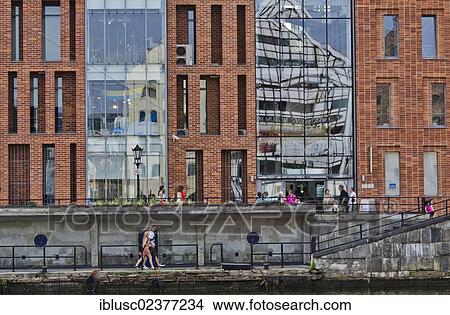 Picture - "Reflections in a modern facade at the Long Bridge, from Bleihof island, Gdansk, Poland, Europe". Fotosearch