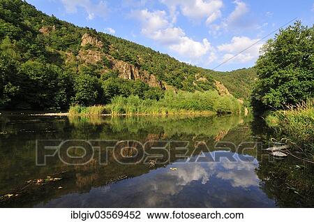 "Reflections in the calm waters of the upper Loire River, Gorge de la Loire, Haute-Loire department, Auvergne, France, Europe" View Large Photo Image Stock Image - "Reflections in the calm waters of the upper Loire River, Gorge de la Loire, Haute-Loire department, Auvergne, France, Europe". Fotosearch