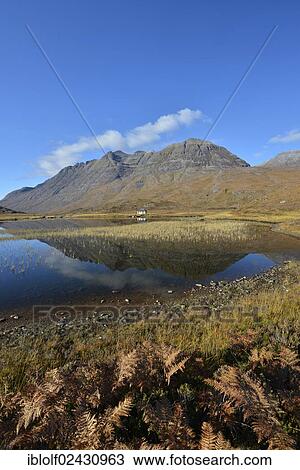 "Reflections in the lake in front of Mt Liathach, Glen Torridon, Beinn Eighe National Nature Reserve, SNH, Kinlochewe, Scottish Highlands, Wester Ross, Scotland, United Kingdom, Europe" View Large Photo Image Stock Image - "Reflections in the lake in front of Mt Liathach, Glen Torridon, Beinn Eighe National Nature Reserve, SNH, Kinlochewe, Scottish Highlands, Wester Ross, Scotland, United Kingdom, Europe". Fotosearch