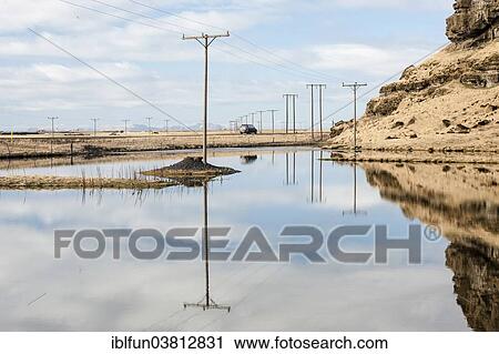 Stock Image - "Reflections in water at Route 1 or Ring Road, near Skogar, South Coast, Iceland, Europe". Fotosearch