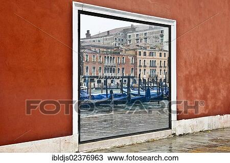 Stock Image - "Reflections of the Grand Canal in a window, Venice, Italy, Europe". Fotosearch