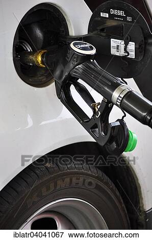 "Refuelling of a car with diesel fuel, detail view" View Large Photo Image Stock Photo - "Refuelling of a car with diesel fuel, detail view". Fotosearch