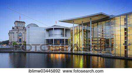 Stock Image - "Reichstag Building and Paul Loebe House at the blue hour, with the Spree River at the front, Government District, Berlin, Berlin, Germany, Europe". Fotosearch