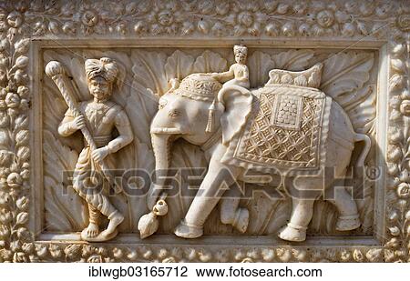 "Relief in a marble facade, mahout or elephant driver and elephant, rat temple of the goddess Karni Mata, Karni Mata Temple, Deshnok, Rajasthan, India, Asia" View Large Photo Image Stock Image - "Relief in a marble facade, mahout or elephant driver and elephant, rat temple of the goddess Karni Mata, Karni Mata Temple, Deshnok, Rajasthan, India, Asia". Fotosearch