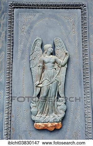 "Relief on a church door, Sainte Baudile Church, Noves, Bouches-du-Rhone, Provence-Alpes-Cote d'Azur, Southern France, France, Europe" View Large Photo Image Stock Photo - "Relief on a church door, Sainte Baudile Church, Noves, Bouches-du-Rhone, Provence-Alpes-Cote d'Azur, Southern France, France, Europe". Fotosearch