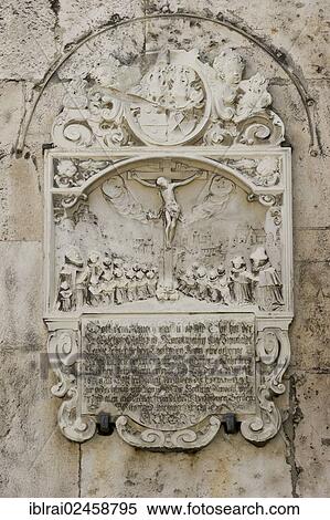 "Relief plaque with Jesus on the Cross, St. Peter's Cathedral, Regensburg, Upper Palatinate, Bavaria, Germany, Europe" View Large Photo Image Stock Photography - "Relief plaque with Jesus on the Cross, St. Peter's Cathedral, Regensburg, Upper Palatinate, Bavaria, Germany, Europe". Fotosearch