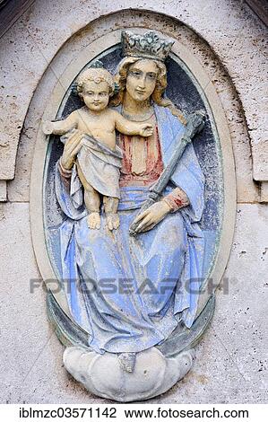 "Relief, representation of St Mary with the baby Jesus on a grave in a cemetery, Tegernsee, Upper Bavaria, Bavaria, Germany, Europe" View Large Photo Image Stock Image - "Relief, representation of St Mary with the baby Jesus on a grave in a cemetery, Tegernsee, Upper Bavaria, Bavaria, Germany, Europe". Fotosearch