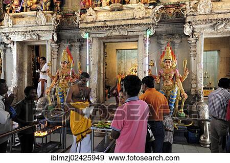 "Religious ritual in a Hindu temple, Veerama Kaliamman Temple, Serangoon Road, in the Indian district, Little India, city centre, Singapore, Asia" View Large Photo Image Stock Photo - "Religious ritual in a Hindu temple, Veerama Kaliamman Temple, Serangoon Road, in the Indian district, Little India, city centre, Singapore, Asia". Fotosearch