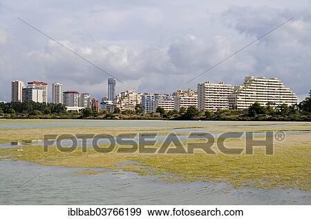 "Remains of Roman salt pans, high-rise buildings at back, Calp, Costa Blanca, Alicante province, Spain, Europe" View Large Photo Image Stock Photo - "Remains of Roman salt pans, high-rise buildings at back, Calp, Costa Blanca, Alicante province, Spain, Europe". Fotosearch