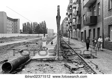 "Remains of the Berlin Wall between Neukoelln, right, and Treptow, Berlin Wall Heidelberger Strasse road, Berlin, Germany, Europe" View Large Photo Image Stock Image - "Remains of the Berlin Wall between Neukoelln, right, and Treptow, Berlin Wall Heidelberger Strasse road, Berlin, Germany, Europe". Fotosearch