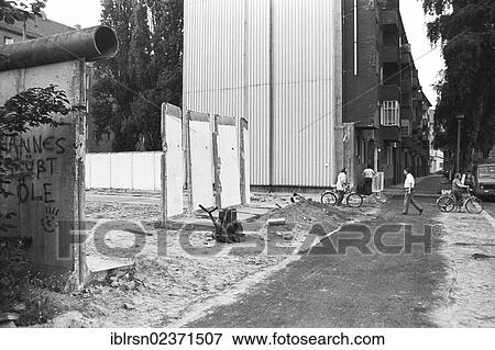 "Remains of the Berlin Wall, strip of the Berlin Wall Heidelberger Strasse road between Neukoelln and Treptow, Berlin, Germany, Europe" View Large Photo Image Stock Photo - "Remains of the Berlin Wall, strip of the Berlin Wall Heidelberger Strasse road between Neukoelln and Treptow, Berlin, Germany, Europe". Fotosearch