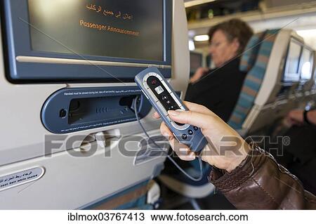 "Remote control for operating the in-flight entertainment on a plane, Germany, Europe" View Large Photo Image Stock Image - "Remote control for operating the in-flight entertainment on a plane, Germany, Europe". Fotosearch