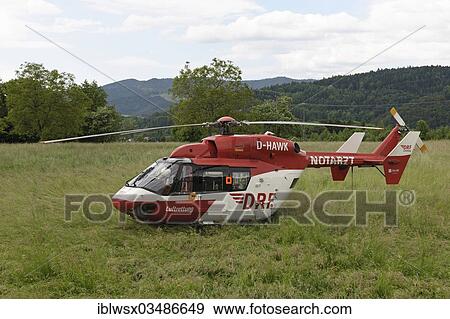 Stock Photo - "Rescue helicopter in action after a serious accident, Kirchzarten, Baden-Wurttemberg, Germany, Europe". Fotosearch