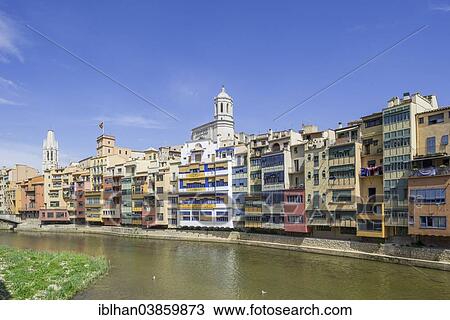 "Residential buildings on the Onyar River, Girona Cathedral at the back, Girona, Catalonia, Spain, Europe" View Large Photo Image Stock Image - "Residential buildings on the Onyar River, Girona Cathedral at the back, Girona, Catalonia, Spain, Europe". Fotosearch
