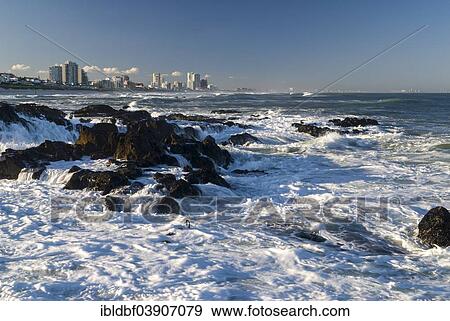 Stock Photo - "Residential buildings, surf and waves of the Atlantic Ocean at the front, Cape Town, Western Cape, South Africa, Africa". Fotosearch