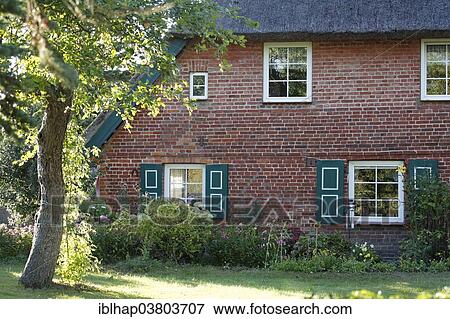 Stock Photo - "Residential house made from brick, Ahrenshoop, Fischland-Darss-Zingst, Mecklenburg-Vorpommern, Germany, Europe". Fotosearch