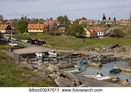 "Residential houses and a fishing harbour, Bornholm, Svaneke |Svaneke|, Region Hovedstaden, Denmark, Europe" View Large Photo Image Stock Image - "Residential houses and a fishing harbour, Bornholm, Svaneke |Svaneke|, Region Hovedstaden, Denmark, Europe". Fotosearch