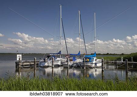 "Rest area for boaters at the Bodden, Dierhagen-Dorf, Mecklenburg-Vorpommern, Germany, Europe" View Large Photo Image Stock Photo - "Rest area for boaters at the Bodden, Dierhagen-Dorf, Mecklenburg-Vorpommern, Germany, Europe". Fotosearch