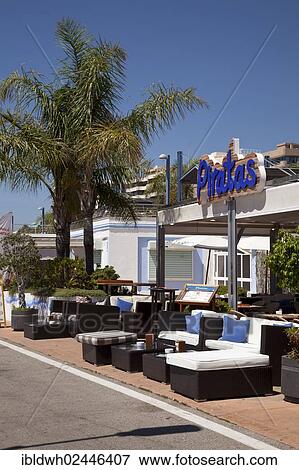 "Restaurant and palm trees on the promenade, Marbella, Costa del Sol, Andalusia, Spain, Europe, PublicGround, Europe" View Large Photo Image Stock Photo - "Restaurant and palm trees on the promenade, Marbella, Costa del Sol, Andalusia, Spain, Europe, PublicGround, Europe". Fotosearch