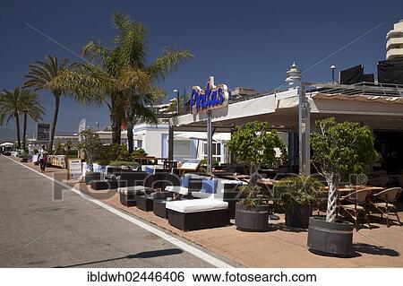 "Restaurant and palm trees on the promenade, Marbella, Costa del Sol, Andalusia, Spain, Europe, PublicGround, Europe" View Large Photo Image Stock Photograph - "Restaurant and palm trees on the promenade, Marbella, Costa del Sol, Andalusia, Spain, Europe, PublicGround, Europe". Fotosearch
