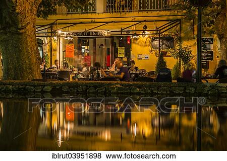 "Restaurant at a water basin, at night, Cucuron, Vaucluse, Provence-Alpes-Cote d'Azur, France, Europe" View Large Photo Image Stock Photo - "Restaurant at a water basin, at night, Cucuron, Vaucluse, Provence-Alpes-Cote d'Azur, France, Europe". Fotosearch