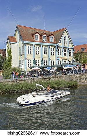 "Restaurant at the lift bridge, Plau, Mecklenburg Lake District, Mecklenburg-Western Pomerania, Germany, Europe" View Large Photo Image Stock Photo - "Restaurant at the lift bridge, Plau, Mecklenburg Lake District, Mecklenburg-Western Pomerania, Germany, Europe". Fotosearch