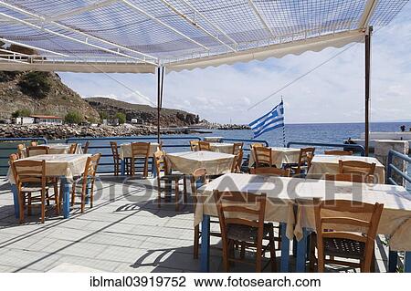 "Restaurant at the port of Hora Sfakion, Crete, Greece, Europe" View Large Photo Image Stock Image - "Restaurant at the port of Hora Sfakion, Crete, Greece, Europe". Fotosearch
