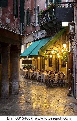 Stock Photo - "Restaurant in an alley at night, Venice, Venezien, Italy, Europe". Fotosearch