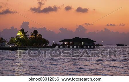 "Restaurant of Paradise Island at dusk, Indian Ocean, Lankanfinolhu, North Male Atoll, Maldives, Asia" View Large Photo Image Stock Photograph - "Restaurant of Paradise Island at dusk, Indian Ocean, Lankanfinolhu, North Male Atoll, Maldives, Asia". Fotosearch