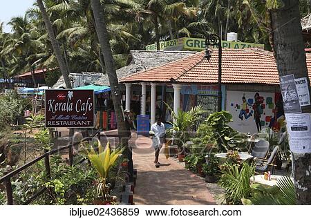 "Restaurants and shops under palm trees, Varkala Beach, Kerala, India, Asia" View Large Photo Image Stock Photo - "Restaurants and shops under palm trees, Varkala Beach, Kerala, India, Asia". Fotosearch
