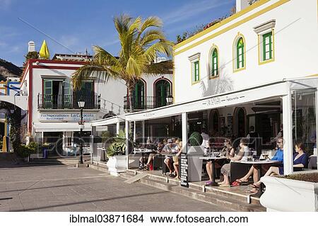 "Restaurants and waterfront on the harbor, Puerto de Mogan, Gran Canaria, Canary Islands, Spain, Europe" View Large Photo Image Picture - "Restaurants and waterfront on the harbor, Puerto de Mogan, Gran Canaria, Canary Islands, Spain, Europe". Fotosearch