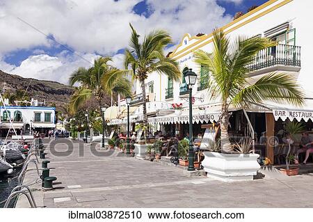 "Restaurants and waterfront on the harbor, Puerto de Mogan, Gran Canaria, Canary Islands, Spain, Europe" View Large Photo Image Stock Image - "Restaurants and waterfront on the harbor, Puerto de Mogan, Gran Canaria, Canary Islands, Spain, Europe". Fotosearch