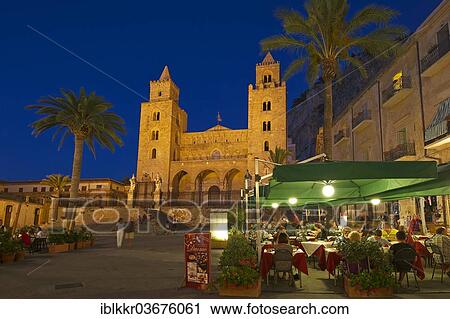 "Restaurants on Piazza Duomo square in the evening, Cathedral-Basilica of the Holy Saviour, Basilica Cattedrale del Santissimo Salvatore at the rear, Cefalu, Province of Palermo, Sicily, Italy, Europe" View Large Photo Image Stock Image - "Restaurants on Piazza Duomo square in the evening, Cathedral-Basilica of the Holy Saviour, Basilica Cattedrale del Santissimo Salvatore at the rear, Cefalu, Province of Palermo, Sicily, Italy, Europe". Fotosearch