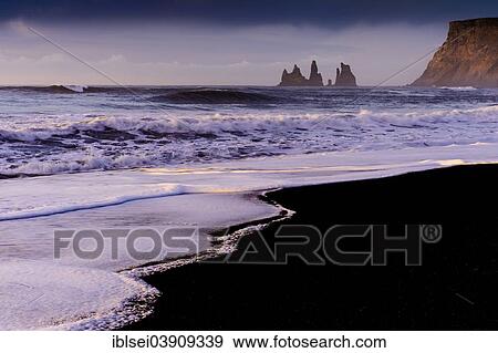 "Reynisdrangar rocks in the sea, Vik, Southern Region, Iceland, Europe" View Large Photo Image Stock Photo - "Reynisdrangar rocks in the sea, Vik, Southern Region, Iceland, Europe". Fotosearch