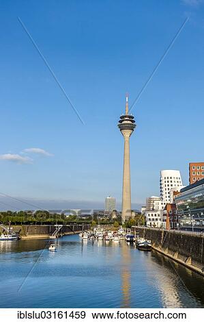 "Rheinturm, Rhine Tower, Medienhafen, media harbour, Dusseldorf, Rhineland, North Rhine-Westphalia, Germany, Europe" View Large Photo Image Stock Photo - "Rheinturm, Rhine Tower, Medienhafen, media harbour, Dusseldorf, Rhineland, North Rhine-Westphalia, Germany, Europe". Fotosearch