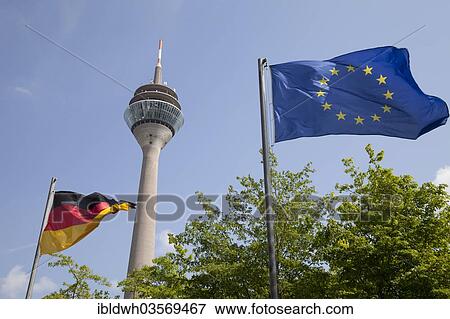 "Rheinturm, telecommunications tower with the flag of Germany and the flag of Europe, Dusseldorf, Rhineland, North Rhine-Westphalia, Germany, Europe" View Large Photo Image Stock Photo - "Rheinturm, telecommunications tower with the flag of Germany and the flag of Europe, Dusseldorf, Rhineland, North Rhine-Westphalia, Germany, Europe". Fotosearch