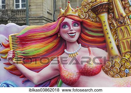 "Rhine Mermaid combing her hair, papier-mache figure for the Rose Monday parade, Carnival, Dusseldorf, North Rhine-Westphalia, Germany, Europe" View Large Photo Image Stock Photo - "Rhine Mermaid combing her hair, papier-mache figure for the Rose Monday parade, Carnival, Dusseldorf, North Rhine-Westphalia, Germany, Europe". Fotosearch