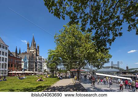 "Rhine Promenade, meadow on the Rhine and Great St. Martin Church, historic centre, Cologne, North Rhine-Westphalia, Germany, Europe" View Large Photo Image Stock Image - "Rhine Promenade, meadow on the Rhine and Great St. Martin Church, historic centre, Cologne, North Rhine-Westphalia, Germany, Europe". Fotosearch