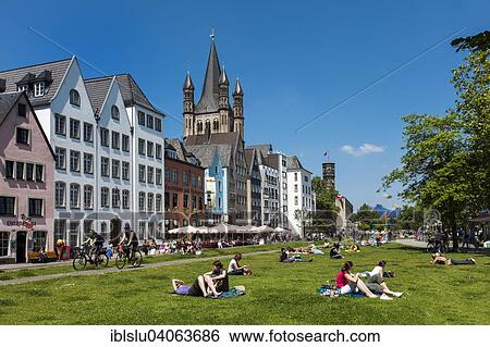 Stock Photograph - "Rhine Promenade, meadow on the Rhine and Great St. Martin Church, historic centre, Cologne, North Rhine-Westphalia, Germany, Europe". Fotosearch