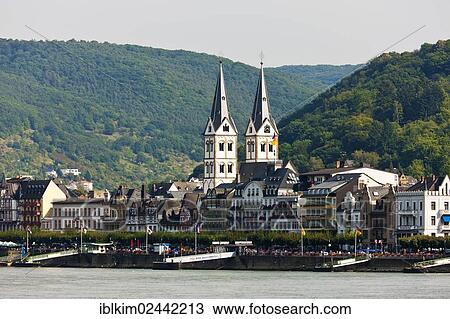 Stock Image - "Rhine River waterfront with St. Severus Church, Boppard, Rhineland-Palatinate, Germany, Europe". Fotosearch