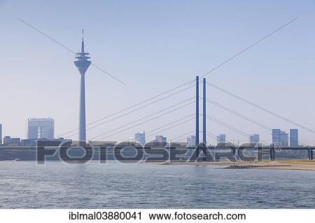 "Rhine Tower and Rheinkniebrucke bridge, Dusseldorf, North Rhine-Westphalia, Germany, Europe" View Large Photo Image Stock Image - "Rhine Tower and Rheinkniebrucke bridge, Dusseldorf, North Rhine-Westphalia, Germany, Europe". Fotosearch