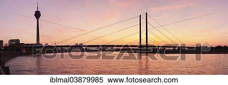 Stock Photography - "Rhine Tower and Rheinkniebrucke bridge, Dusseldorf, North Rhine-Westphalia, Germany, Europe". Fotosearch