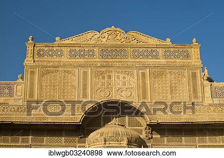"Richly decorated sandstone facade of an old Haveli or private mansion, Mandir Palace Hotel, Royal Palace, Jaisalmer, Rajasthan, India, Asia" View Large Photo Image Stock Photo - "Richly decorated sandstone facade of an old Haveli or private mansion, Mandir Palace Hotel, Royal Palace, Jaisalmer, Rajasthan, India, Asia". Fotosearch